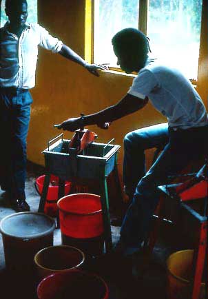 Small, common honey press in Zambia
