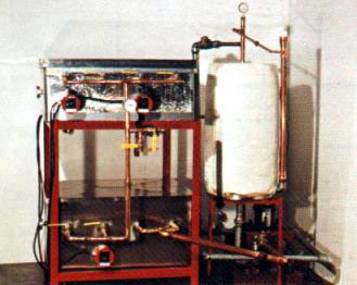 Small to medium-scale vacuum drier for removing moisture from already extracted honey (courtesy of Dadant and Sons, Inc.).