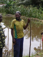 Cameroonian fish farmer learning to adjust to new ways without government