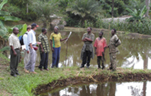 Team visiting a fish farmer in Central Province in Cameroon
