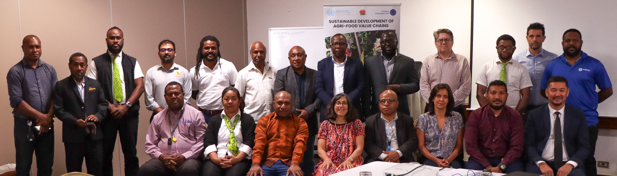 Participant officials and representatives in the Policy Dialogue session, held by the EU-STREIT PNG Programme, posing for a group photo.