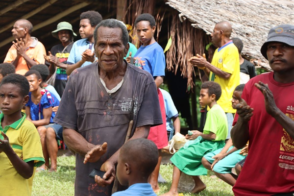 Michael Butuhe, a retired primary-level teacher, and the community leader at Hambini Village.