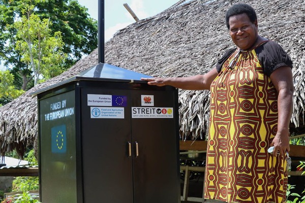 A new Vanilla Solar Dryer provided by the EU-STREIT PNG Programme to Ms Nancy Fale