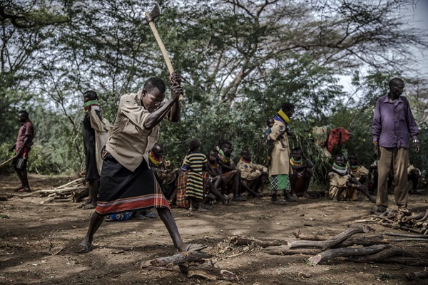 Man chopping wood. Kenya