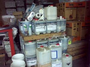 Assortment of new pesticide containers awaiting sale, Samoa