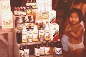 Little girl in pesticides store